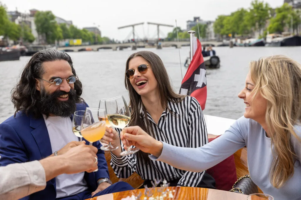 Drinks on deck Amsterdam saloon boat